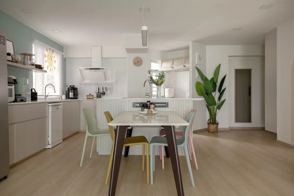 Open concept kitchen in pastel colours